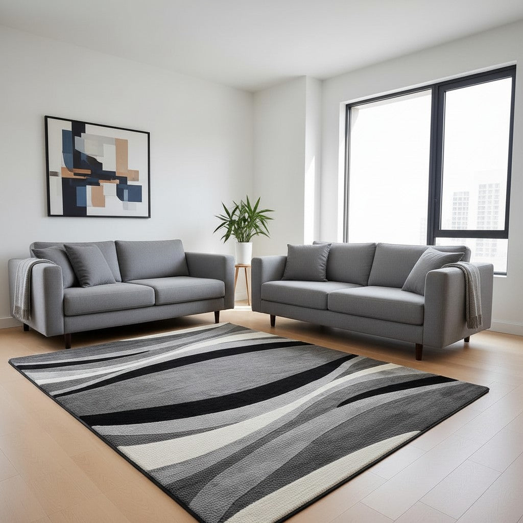 CarpetlyHome Comfort szürke geo mintás szőnyeg, hullámos mintával, 100% polipropilén, 12 mm szálhosszúság, padlófűtéshez is alkalmas.