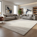 CarpetlyHome Milano krémszínű modern szőnyeg puha textúrával, világos nappaliban elhelyezve