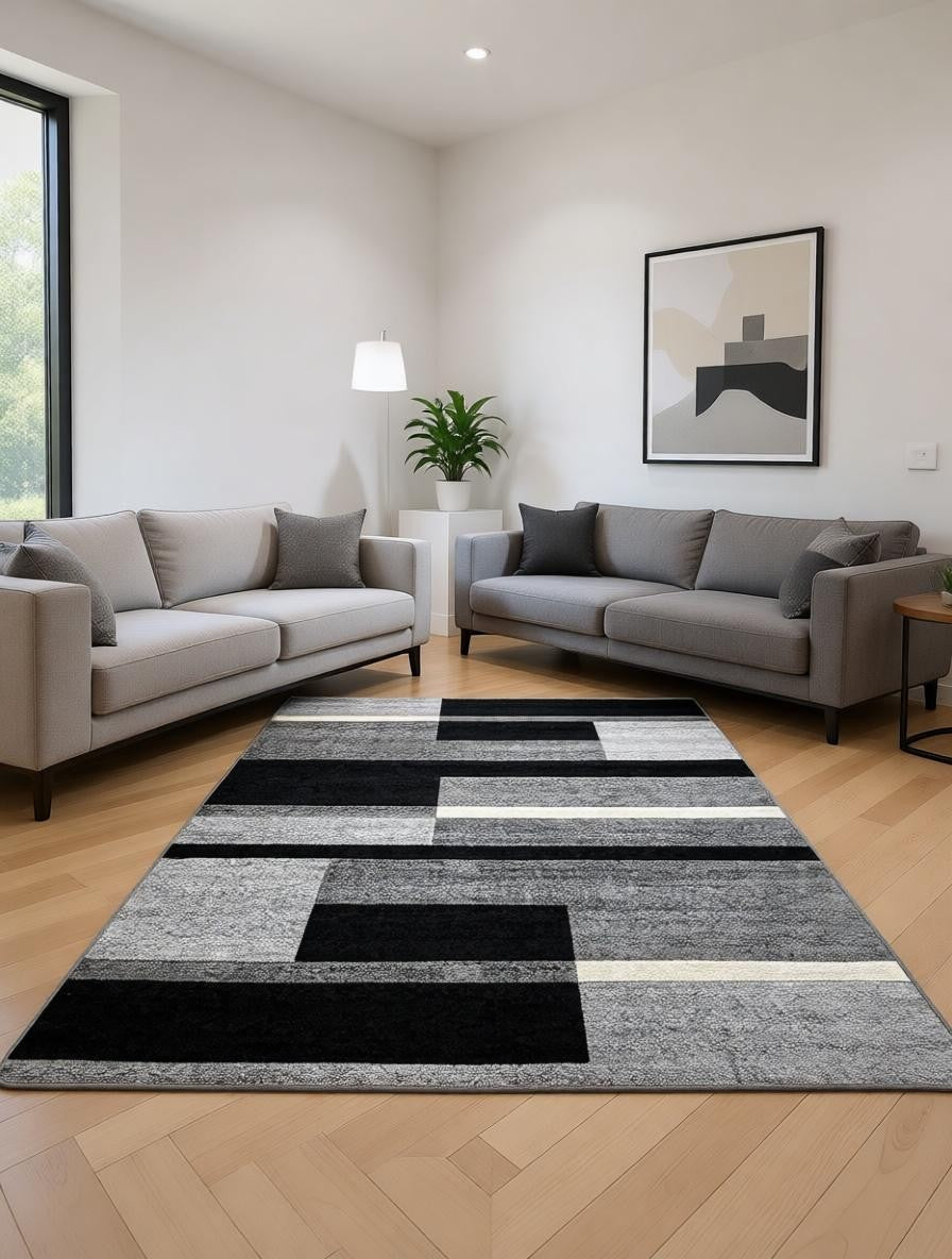 CarpetlyHome modern szürke, fekete és fehér geometriai mintás szőnyeg, 100% polipropilén, 12 mm szálhossz.