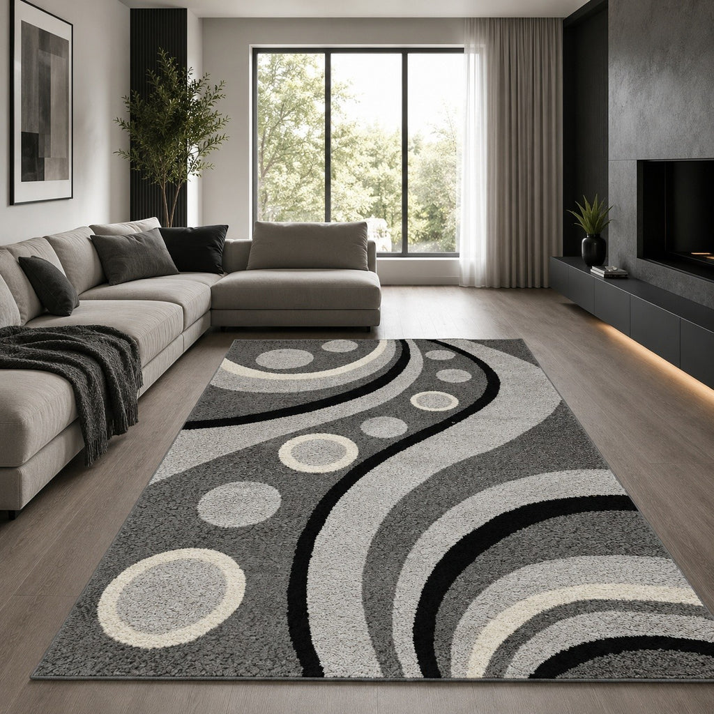 CarpetlyHome Nora szürke, absztrakt mintás modern szőnyeg körökkel és hullámvonalakkal egy stílusos nappaliban.